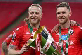 Former PNE skipper Tom Clarke with Salford team-mate Ash Eastham at Wembley