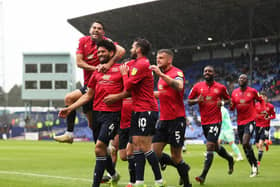 Nat Knight-Percival celebrates scoring Morecambe's opening goal