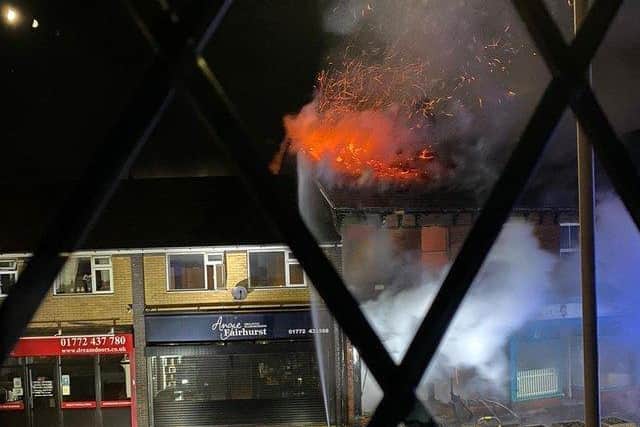 The shop in Towngate, Leyland engulfed in flames.