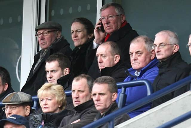 Sir Alex Ferguson (top, right), sitting close to PNE owner Trevor Hemmings, at Deepdale in 2010