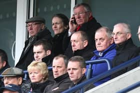 Sir Alex Ferguson (top, right), sitting close to PNE owner Trevor Hemmings, at Deepdale in 2010