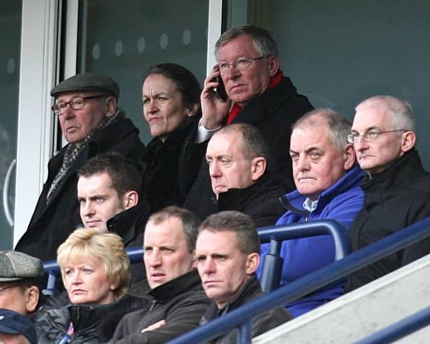 Sir Alex Ferguson (top, right), sitting close to PNE owner Trevor Hemmings, at Deepdale in 2010