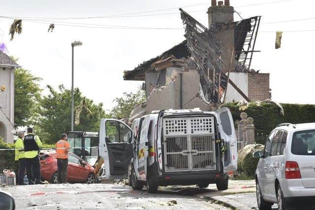 Detectives believe the cause of the explosion was a severed gas pipe inside 20 Mallowdale Avenue.