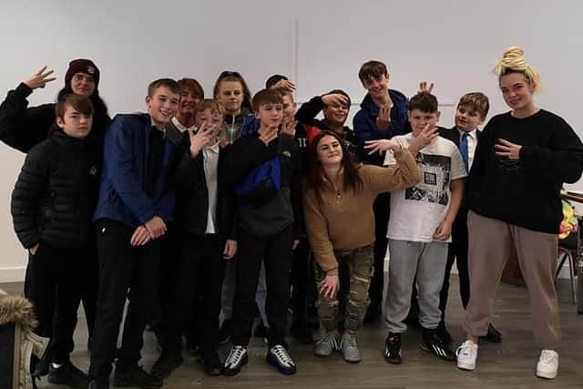 Sophie Aspin (centre) with youngsters from Grange Park taking part in a Grime music workshop