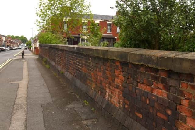 Many of the bricks in the parapets have been degraded by 175 years of Preston weather.