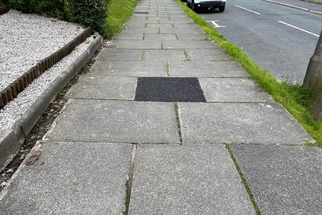 The pavement repair on Keswick Road in Lancaster. Cameron Redpath was thrown out of his wheelchair when he hit a raised paving slab on Keswick Road. He has set up a petition calling for pavements to be upgraded in Lancaster.