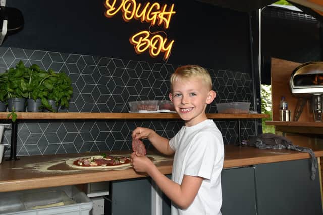Freddie got the chance to make his pizza in real life and it was also featured on the Dough Boy menu.