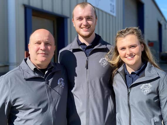 Bloom-in-Box (from left) David Reardon, Tom Reardon, and Hannah Reardon