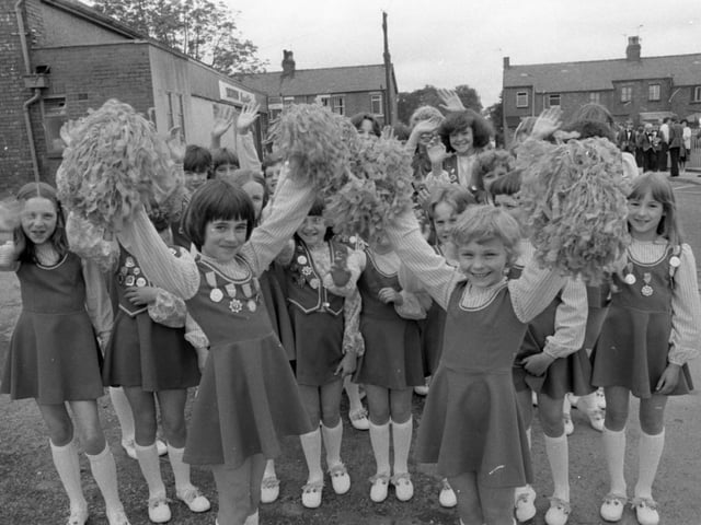 The annual parish church walking day at Eccleston, near Chorley, is a tradition which stretches back for hundreds of years. Pictured: Melanie Weaver (10), left, and Catherine Platt (nine) - two of the Eccleston Morris Dancers - warm up before the Eccleston Walk
