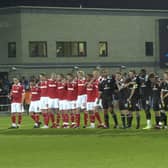 Morecambe and Preston North End players during the penalty shoot-out at the Globe Arena in October 2011