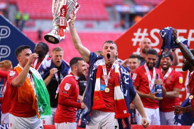 Sam Lavelle skippered Morecambe to victory at Wembley