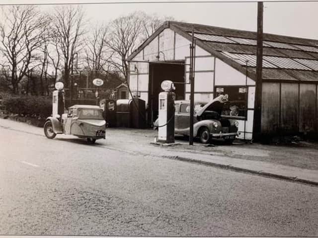 T.N.T garage around 1955. Parked on the garage forecourt is a B.S.A three-wheeler, this belonged to Michael Bruce, Bernard's son, who because he only had a motor cycle licence had to blank off the reverse gear with a metal plate.