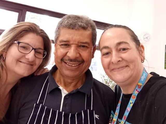 Mustapha with Jayne Evans (left) and Lisa Case at the Big Lamp Fish and Chips shop