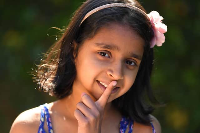Anya Patel, 7, has raised nearly £2,000 for the Indian Covid appeal after a sponsored silence. Photo: Neil Cross.