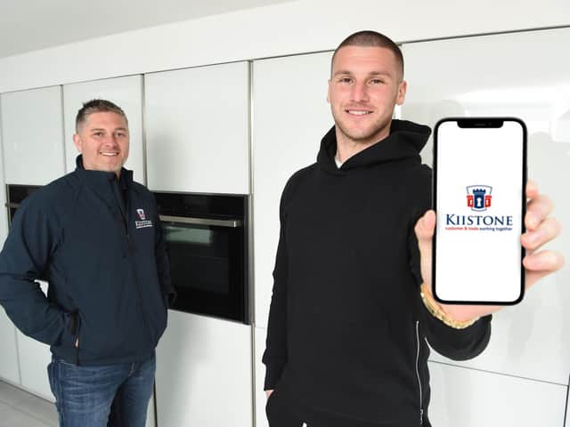 Sam Johnstone, right, with app founder Tim Mullock