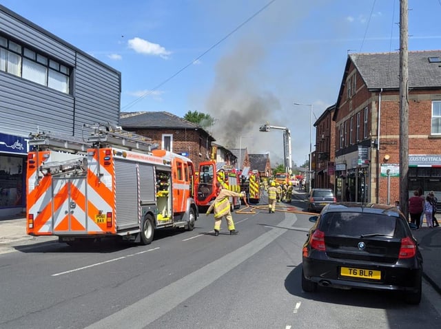 Firefighters at the scene in School Lane.