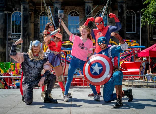Lancaster Superhero event in Market Square. Anya McGinn of Lancaster joins in the fun. Picture by Martin Bostock.
