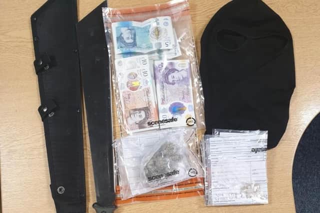 Two men have been arrested in New Hall Lane, Preston after officers found two large machetes, a black balaclava, a quantity of cash and a small amount of cannabis on them last night (Tuesday, June 8)