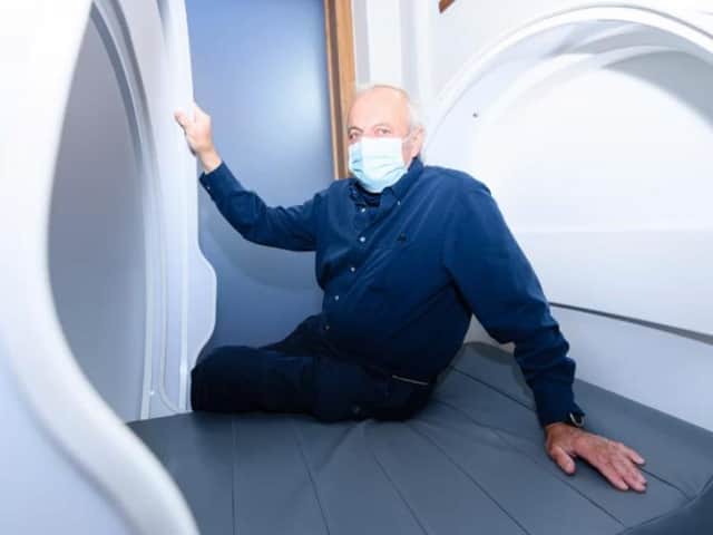 MD Andrew Hall tries out a sleep pod.