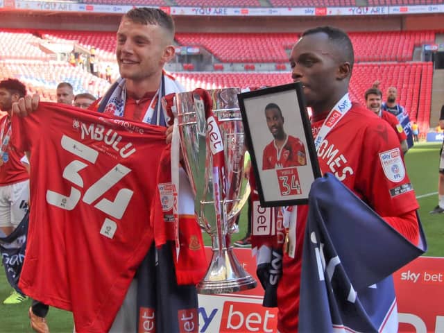 Sam Lavelle and Carlos Mendes Gomes pay tribute to Christian Mbulu after victory at Wembley