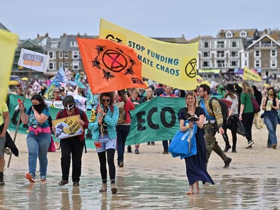 Protesters at the G7 Summit in Cornwall
Picture: Getty Images