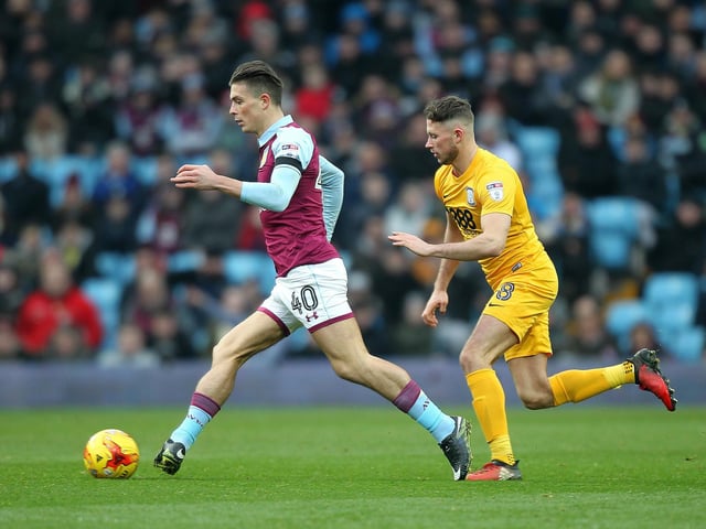 Aston Villa's Jack Grealish is chased by Preston North End midfielder Alan Browne