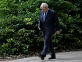 Boris Johnson returns to 10 Downing Street after giving a press conference on June 14