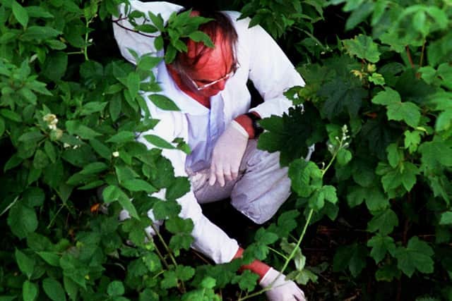 Forensic investigator at the scene where Janet Murgatroyd’s body was discovered