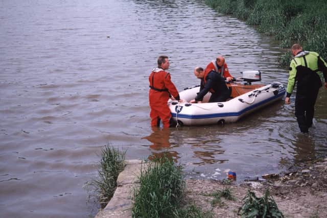 Police at the scene where Janet Murgatroyd’s body was discovered