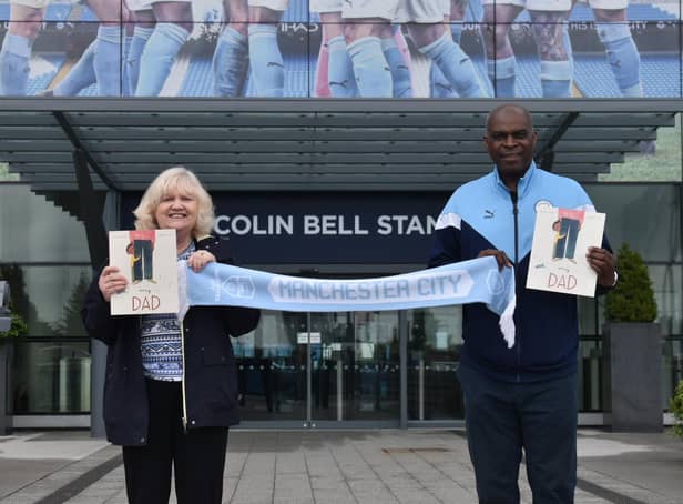 Author Susan Quinn with Manchester City ex-goalie Alex Williams MBE - and her late dad's beloved team scarf - outside the Etihad Stadium.