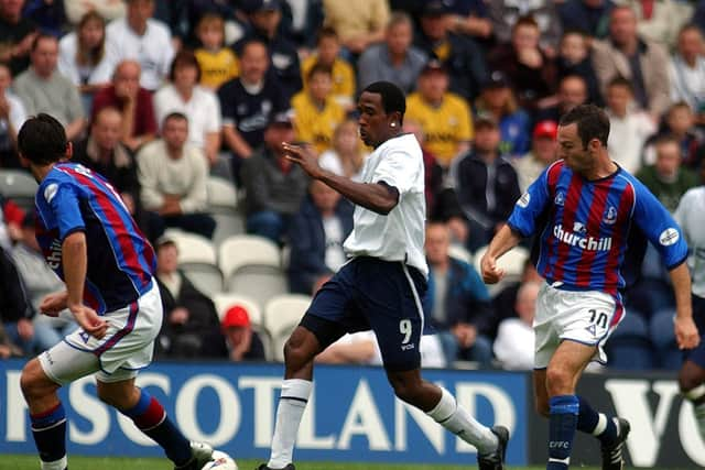 PNE striker Ricardo Fuller runs at the Crystal Palace defence