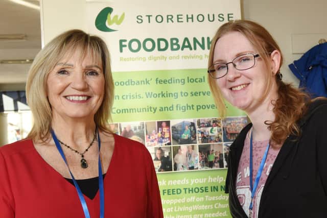 Carol Halton and Helen Schilz at the LW Storehouse food bank in 2019