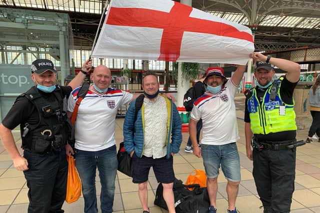 Football officers from Lancashire are down at Preston train station engaging with  fans