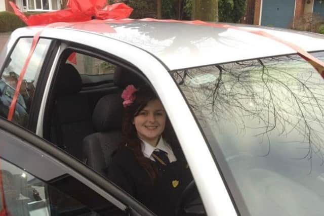 Olivia with her first car - a 16th birthday gift