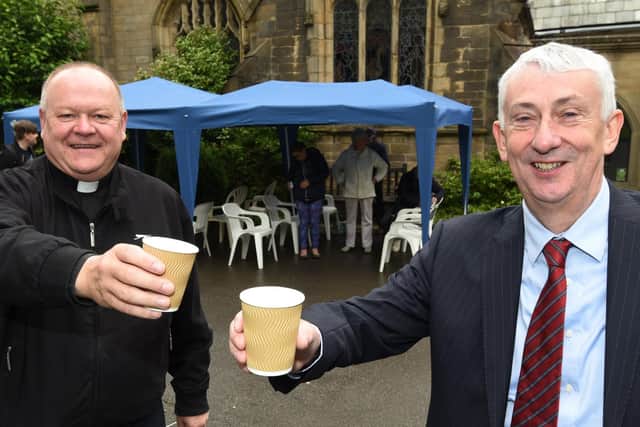Father Neil Kelley, left, of  St Laurence Church and Chorley MP Sir Lyndsay Hoyle, at the launch of Taste, the pay-what-you-can cafe at the church in August 2020