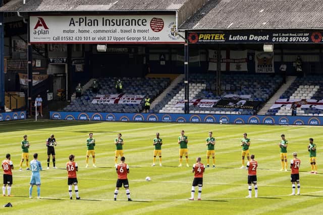 Preston North End and Luton Town players applause NHS workers ahead of he restart game at Kenilworth Road in June 2020