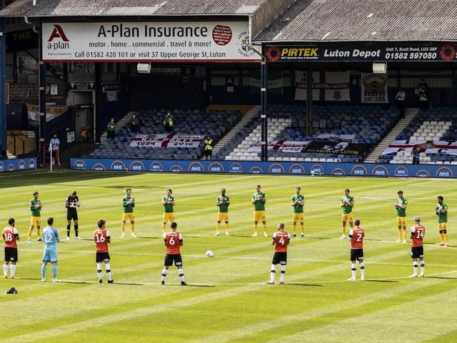 Preston North End and Luton Town players applause NHS workers ahead of he restart game at Kenilworth Road in June 2020