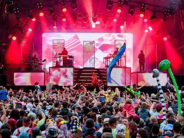 Years and Years performing during the 2019 Kendal Calling.