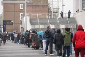 People queueing to get vaccinated