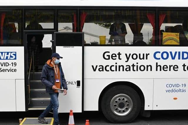 Vaccinations are now being offered to all adults in England, but jabs at mobile and walk-in centres are on a first-come-first-served basis