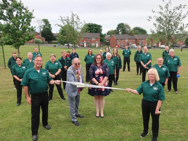 The Mayor of Chorley, councillor Steve Holgate, cuts the bandage at the Angels' new home ceremony at the community centre on Buttermere Avenue