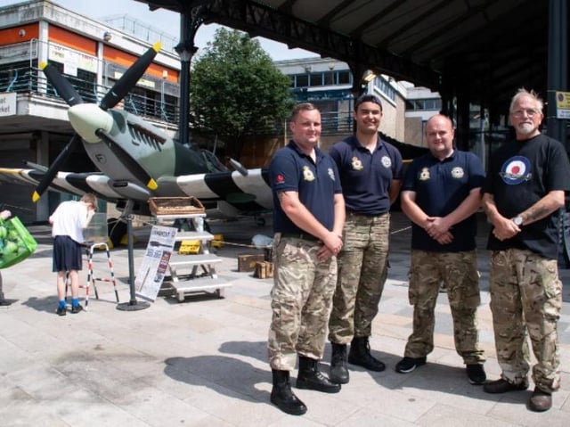 The Lytham St Annes Spitfire Ground Display Team with their fighter plane at Preston's 2019 Armed Forces Day.