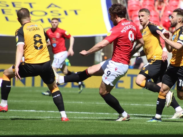 Cole Stockton is one of last season's promotion winners to sign a new deal with Morecambe