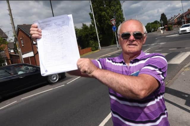 Ernie Hothersall has helped gather almost 600 signatures calling for a safety upgrade at the roundabout (image: Michelle Adamson)