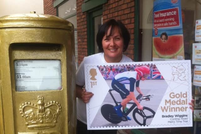 Flashback to 2012 and Lisa Jackson, the sub-postmistress at Eccleston Post Office with the post box and commemorative stamp