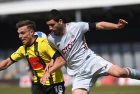 Anthony O'Connor (right) in action for Bradford City against Harrogate