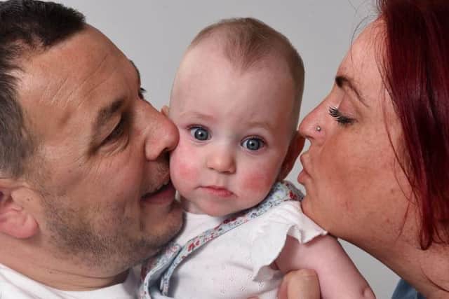 Parents Jade and Stuart enjoy life with baby Stella at home following months of treatment