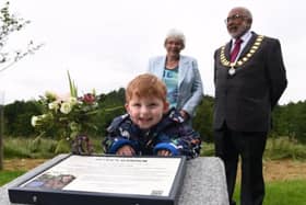 Great grandson Finley, two, at the unveiling of the memorial garden with Peter's widow Nora and Preston Mayor Coun Javed Iqbal.