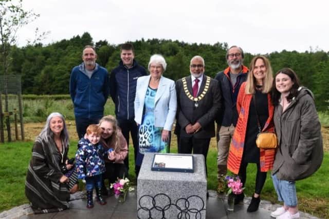 Mayor Coun Javed Iqbal and the Ward family in 'Peter's Garden.'