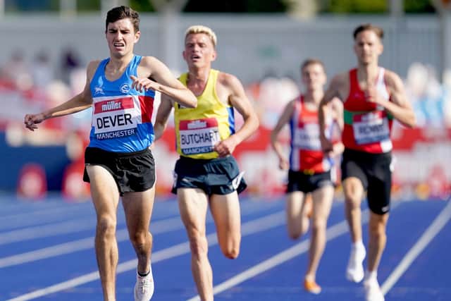Patrick Dever (left) wins the men’s 5,000 metre final in  Manchester